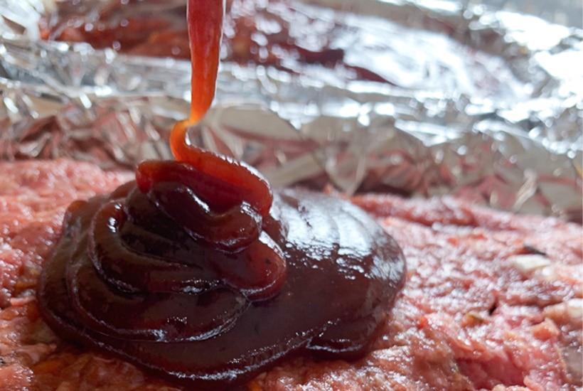 BBQ sauce spread on meatloaf